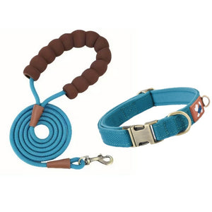Blue padded dog collar with matching rope leash and cushioned loop handle