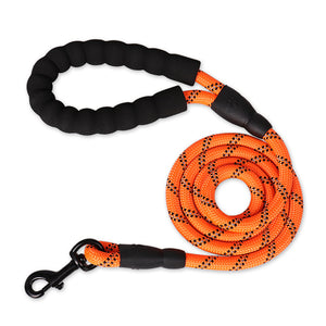 Orange reflective rope dog leash with a black padded handle and metal clasp