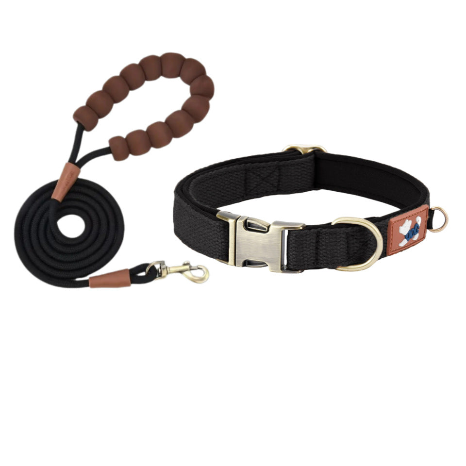 Black padded dog collar with matching rope leash and cushioned loop handle