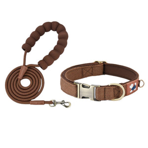 Brown padded dog collar with matching rope leash and cushioned loop handle