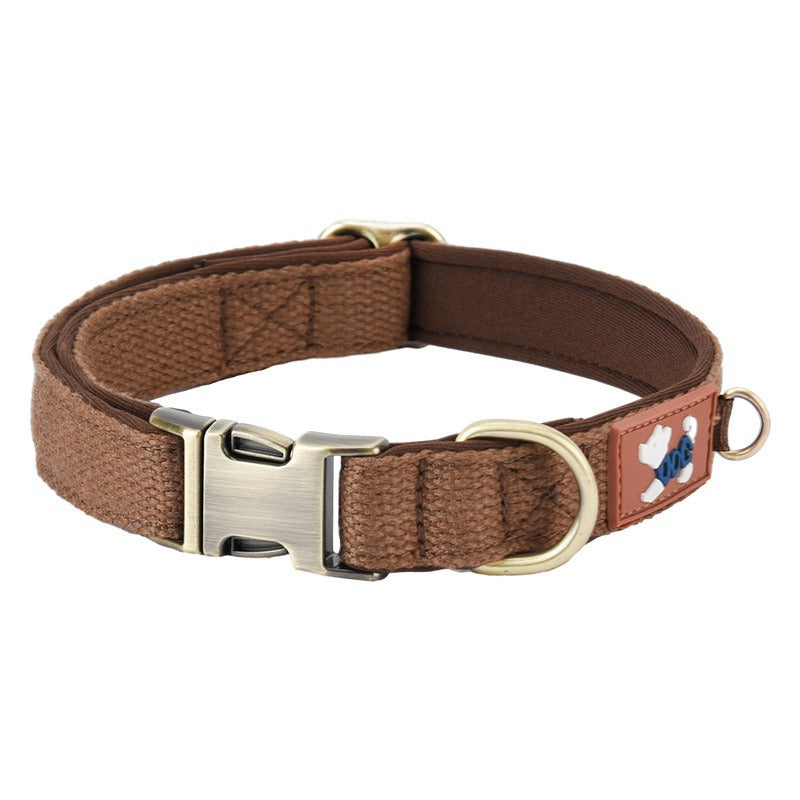Brown padded adjustable dog collar with metal quick-release buckle and D-ring