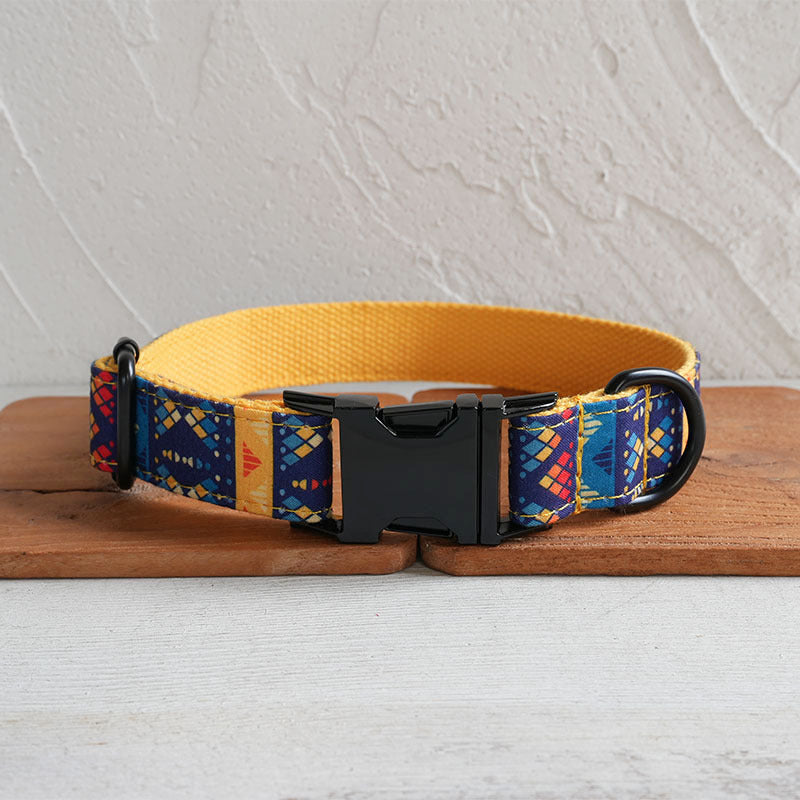 Blue-and-yellow geometric dog collar with black buckle and D-rings