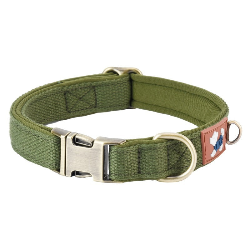Green padded adjustable dog collar with metal quick-release buckle and D-ring